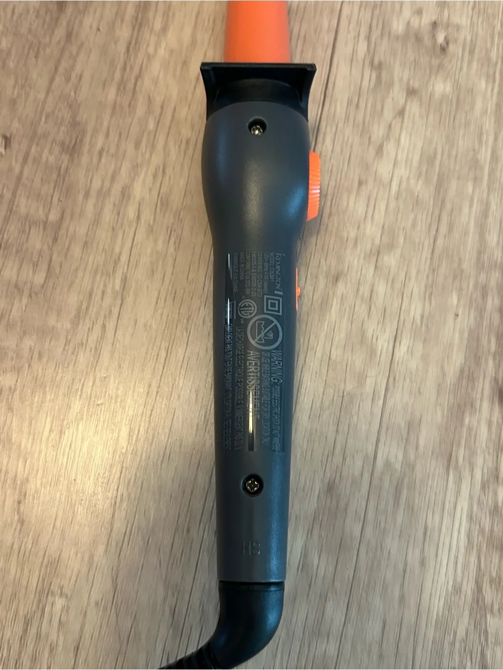 Remington curling iron and protective glove. Like new condition.